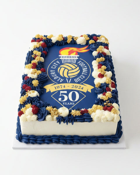 club sport logo on slab cake with buttercream piped detail
